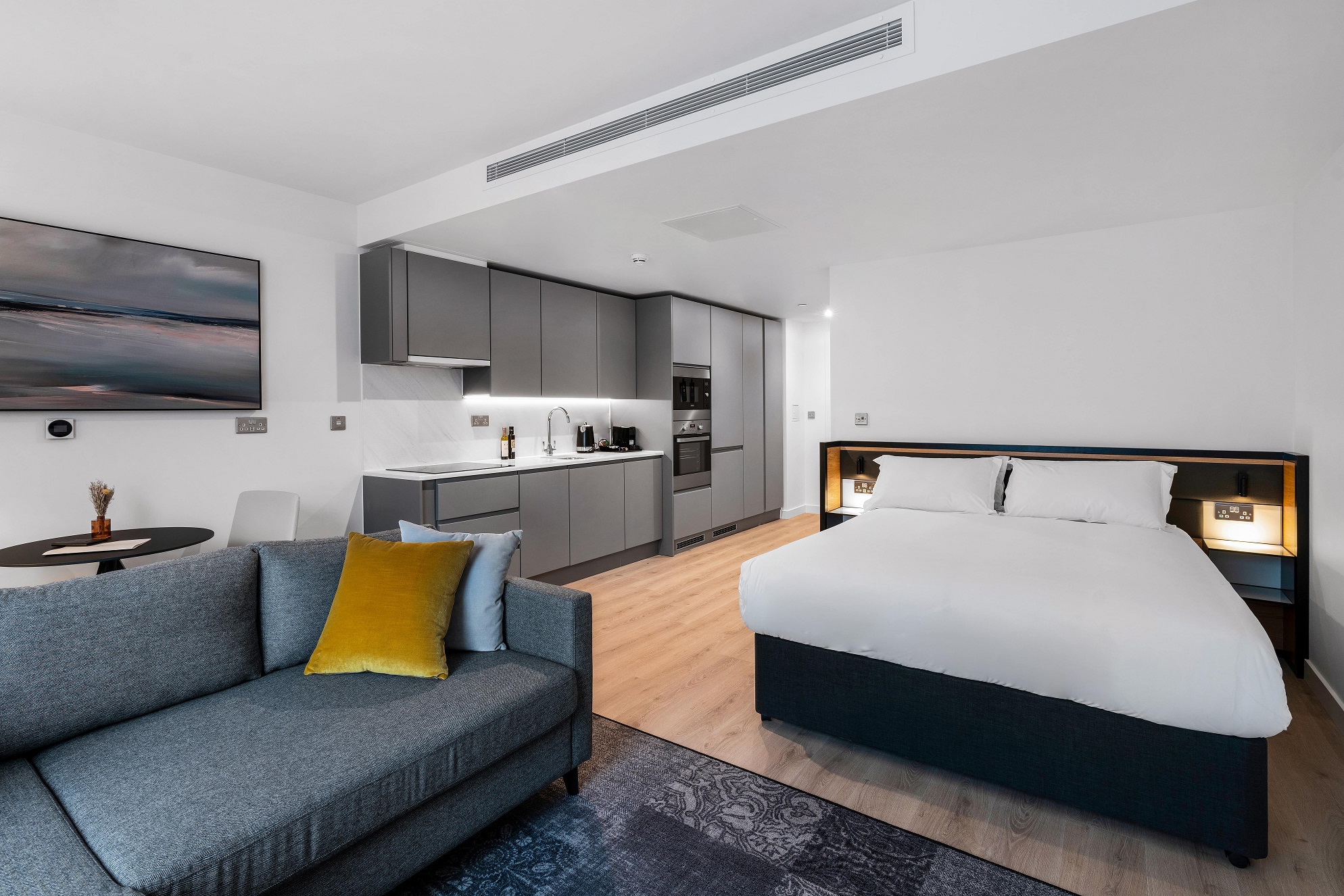 Citysuites Two Luxury Aparthotel Manchester Studio Apartment Sofa Living Room With King Size Bed